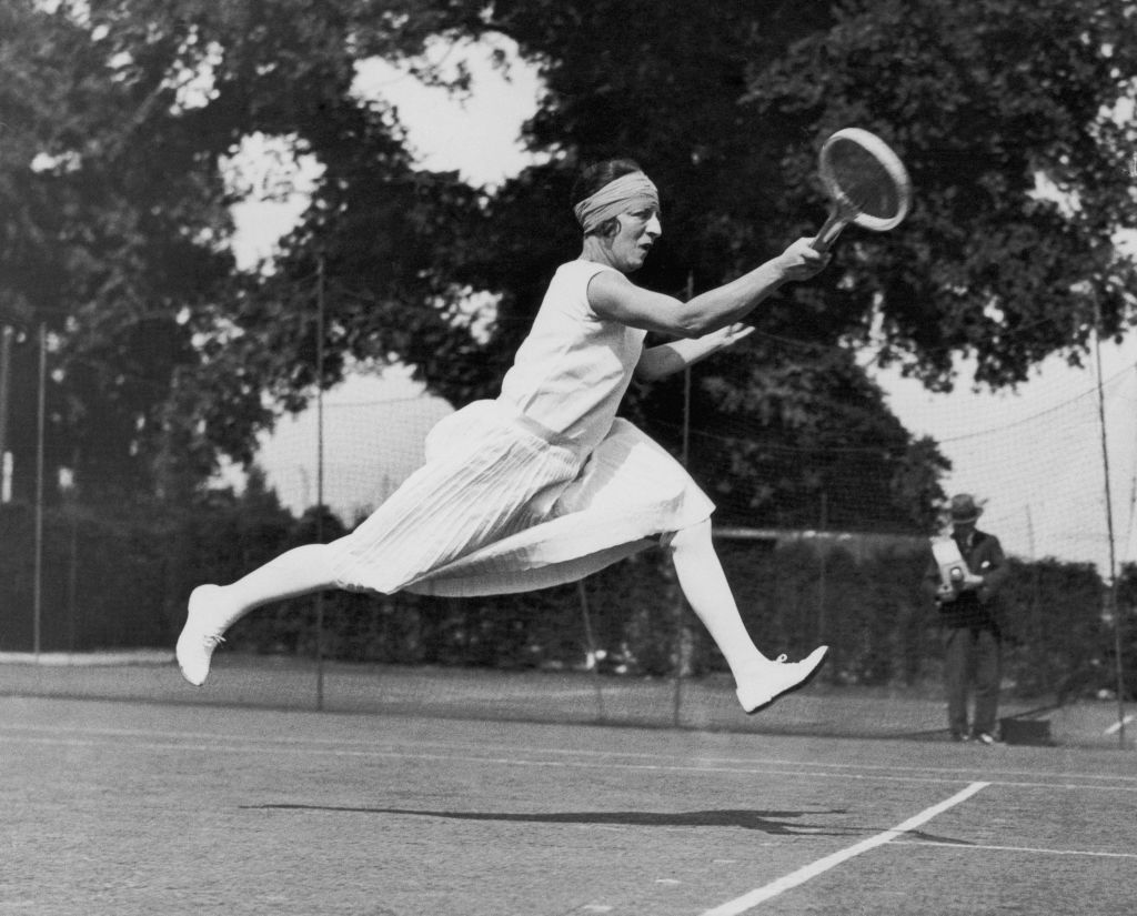 French tennis player Suzanne Lenglen (1899 - 1938) competing at Wimbledon, 1926. (Photo by Central Press/Hulton Archive/Getty Images)