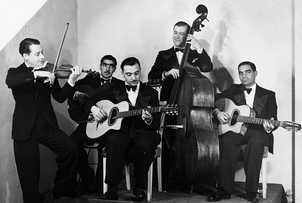 (Original Caption) Django Reinhardt (1910-1953) and Stephane Grappelli, of the Quintet de Hot Club de France. Photograph, ca. 1934.